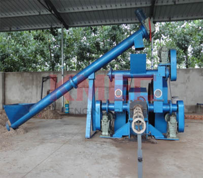 Biomass briquette machine